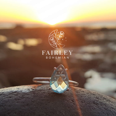 blue topaz ring in sunset